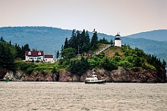 Owls Head Lighthouse Sits Over Rocky Cliffs